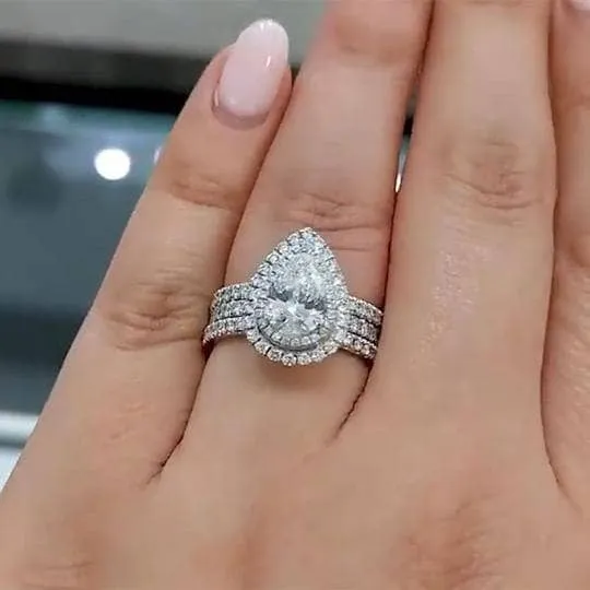 Double Halo Pear Cut 3-Pieces Wedding Set