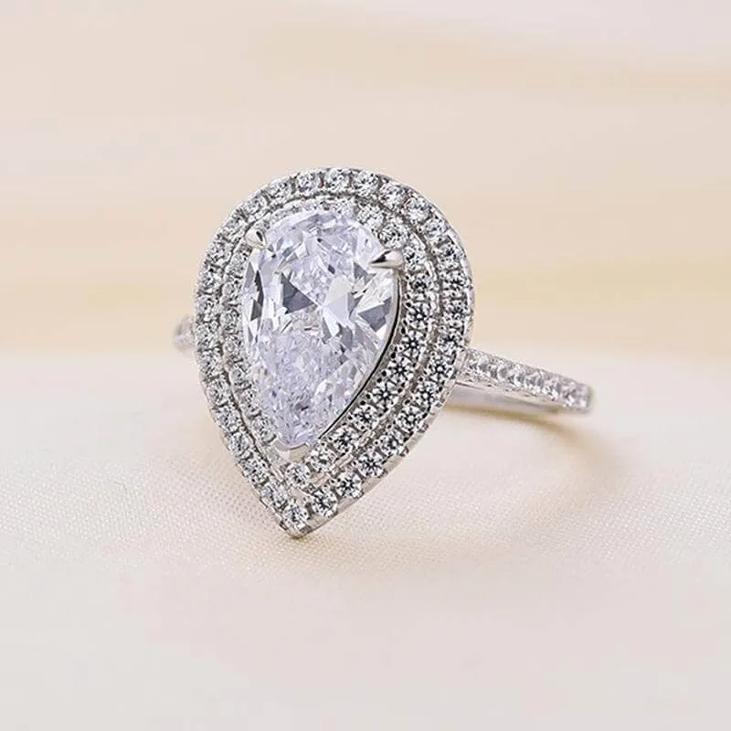 Double Halo Pear Cut 3-Pieces Wedding Set