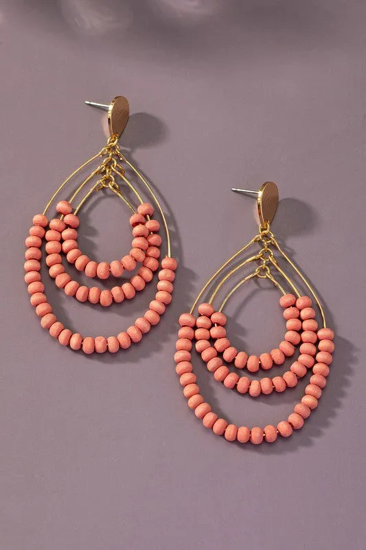 I N S T O C K Three tier wood oval hoop earrings
