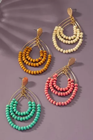 I N S T O C K Three tier wood oval hoop earrings