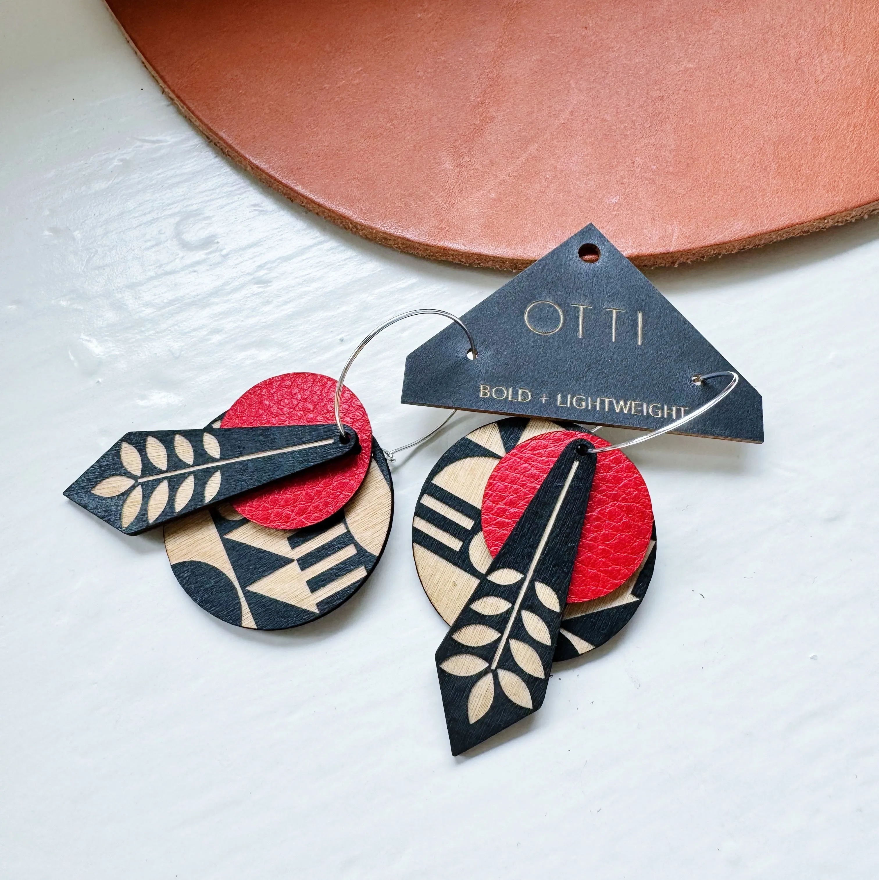 Lightweight leather   birch earrings: Abstracted Art design