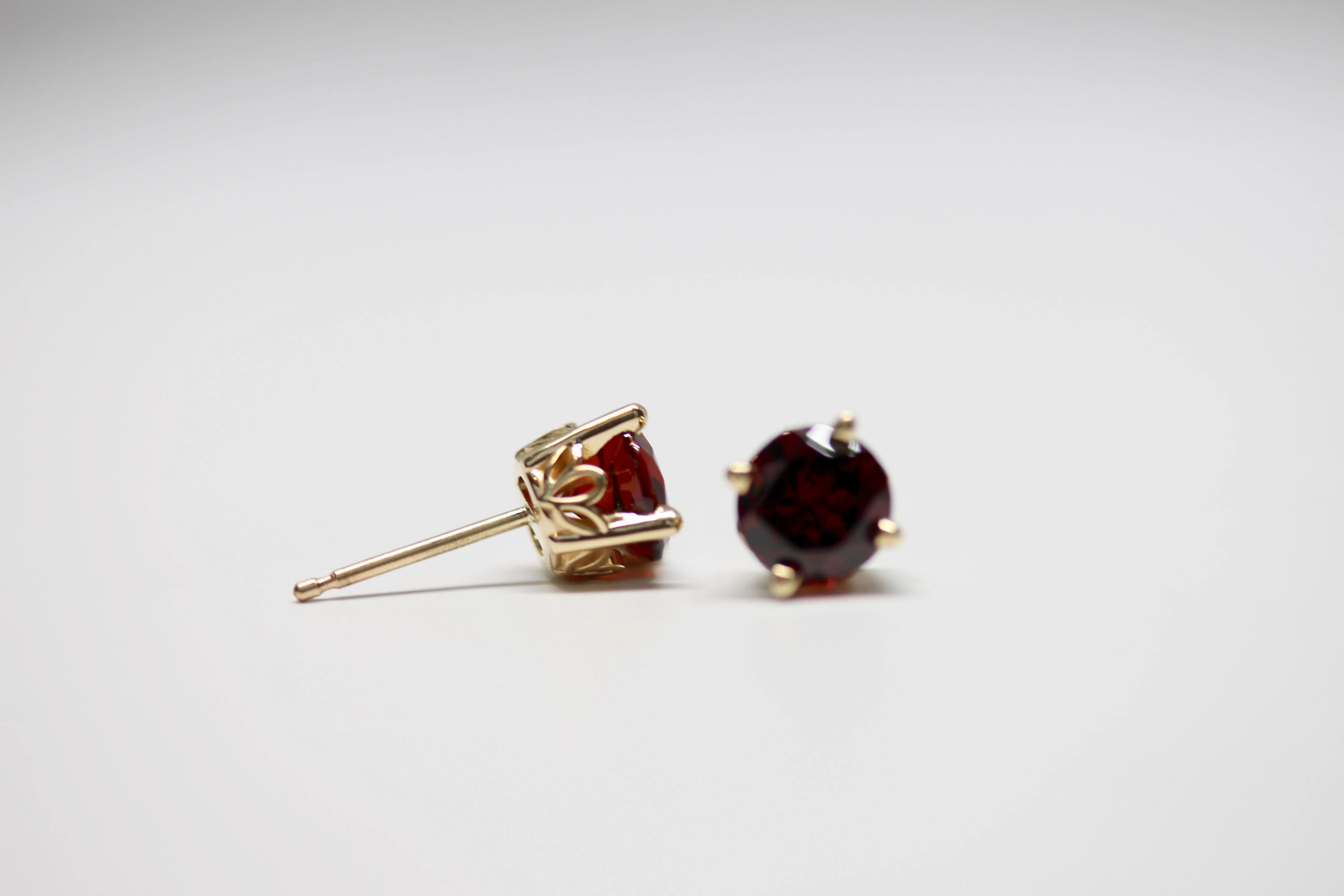 Mozambique Garnet Scroll Design Round 4-Prong Stud Earrings