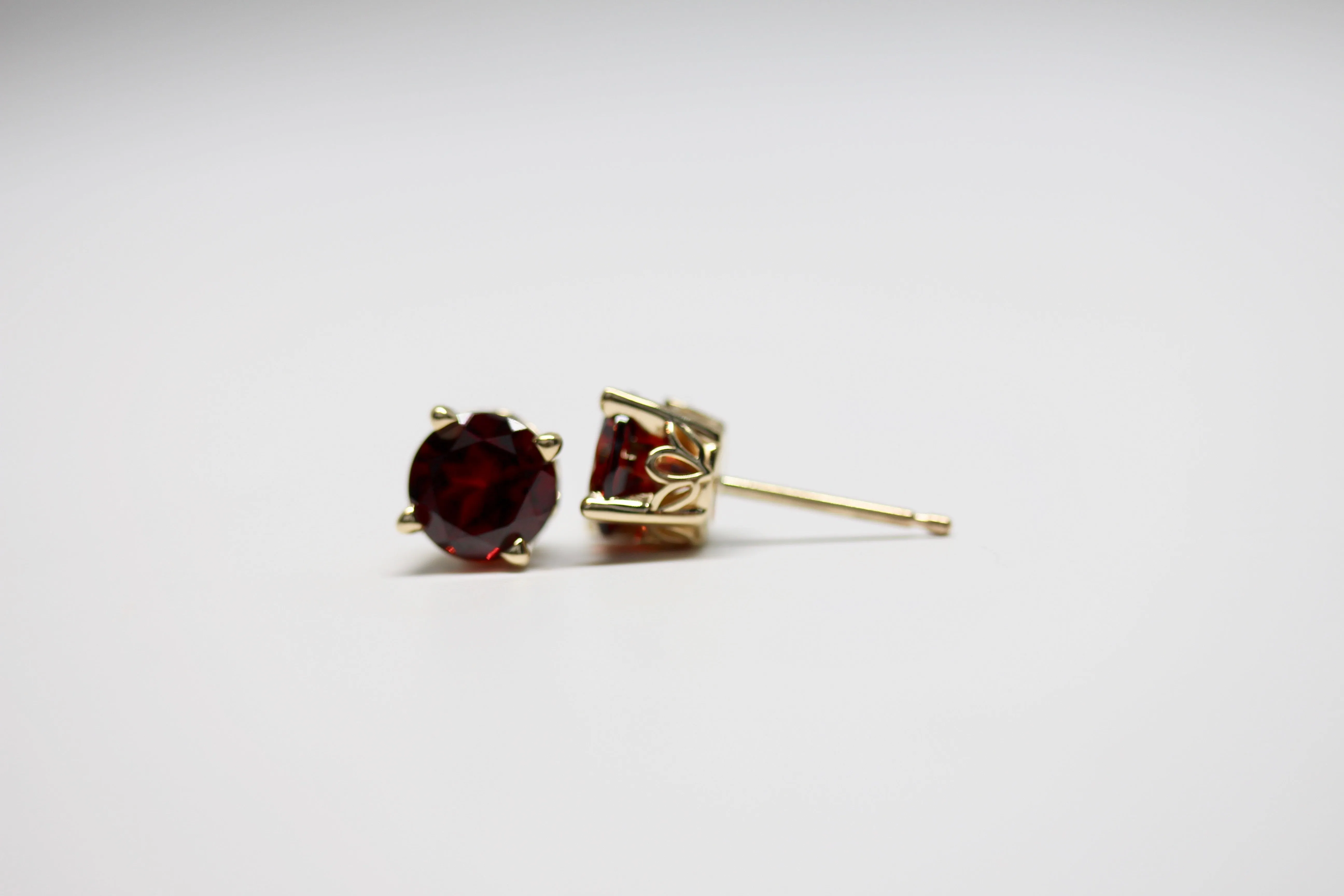 Mozambique Garnet Scroll Design Round 4-Prong Stud Earrings