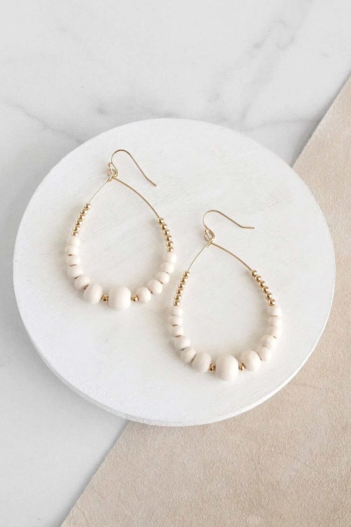 PennyLine inc - Natural Wood & Gold Beaded Teardrop Hoop Earrings in Cream